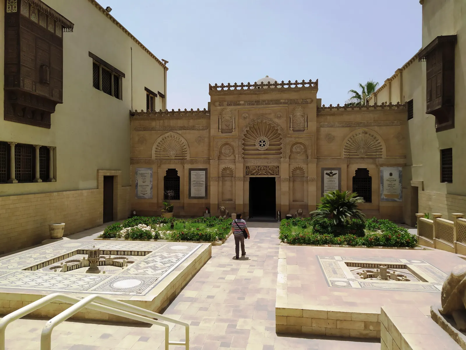 Courtyard of Cairo’s Coptic Museum with mashrabiyas and carved facade