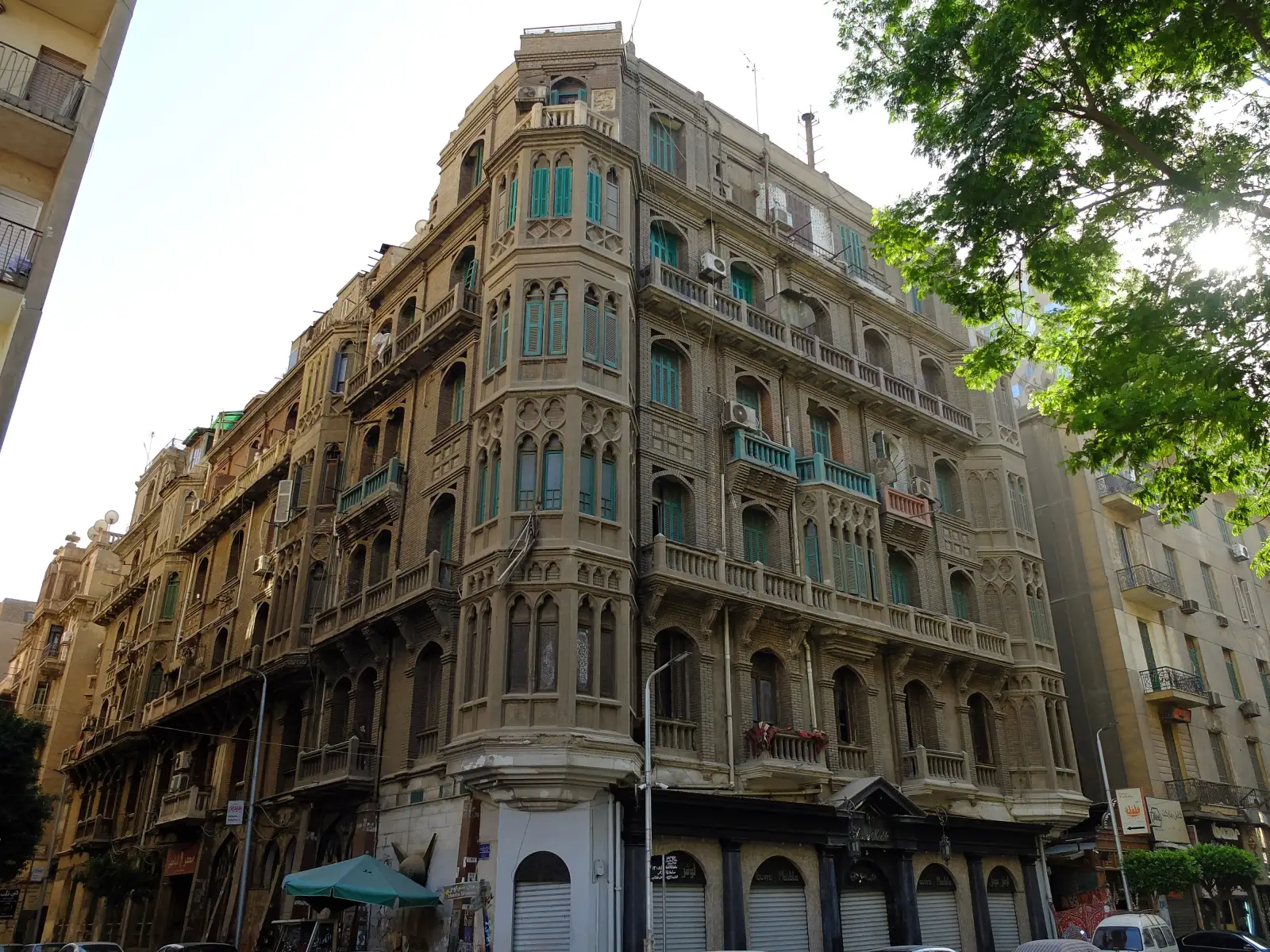 Historic facades and turquoise shutters in downtown Cairo