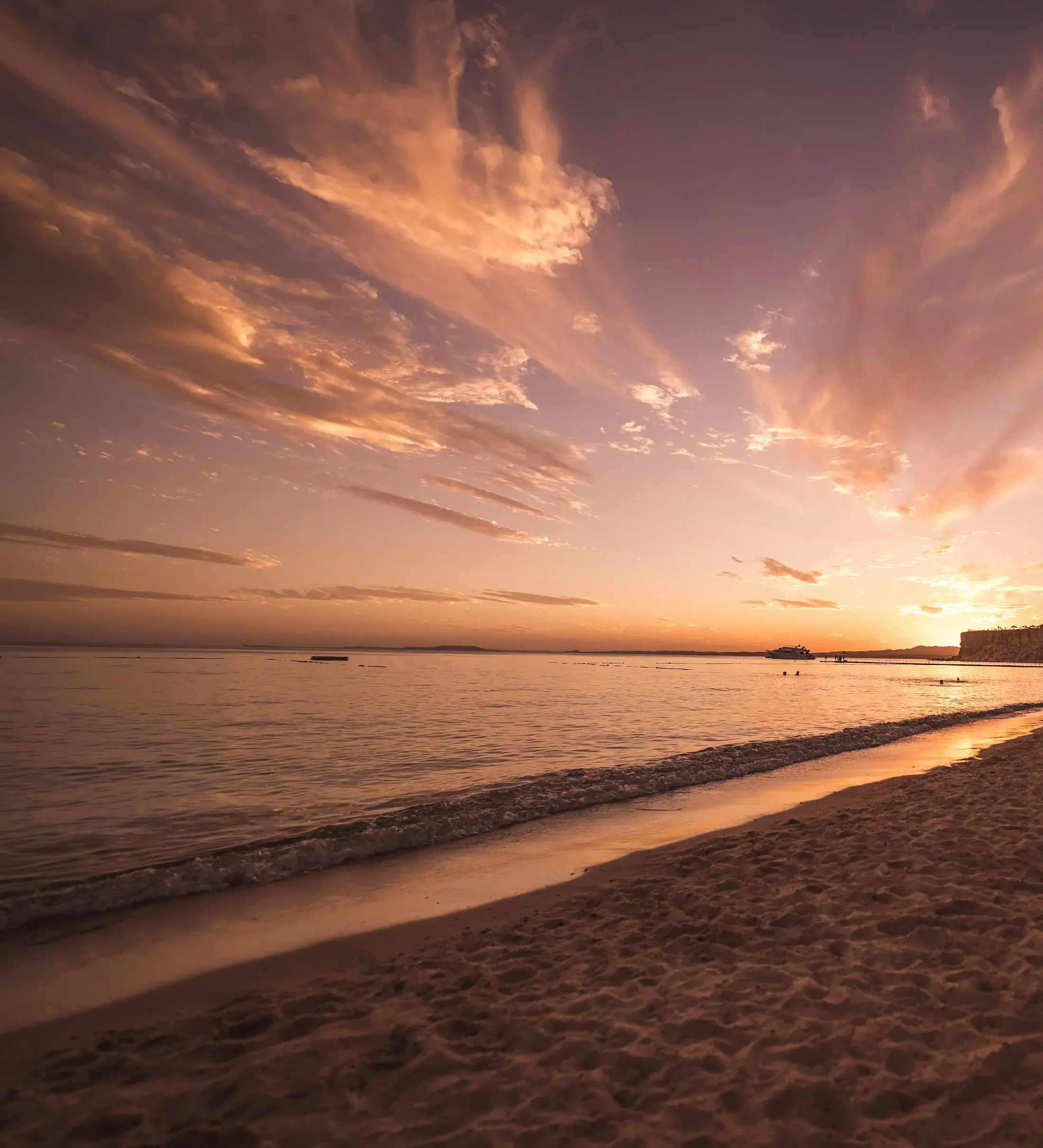 A Sharm el-Sheikh beach in golden sunset light